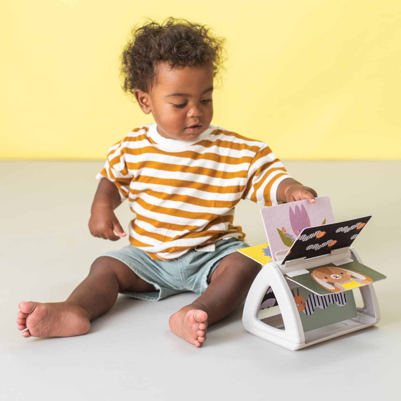 TAF-TOYS Drehbares Babybuch 0M+