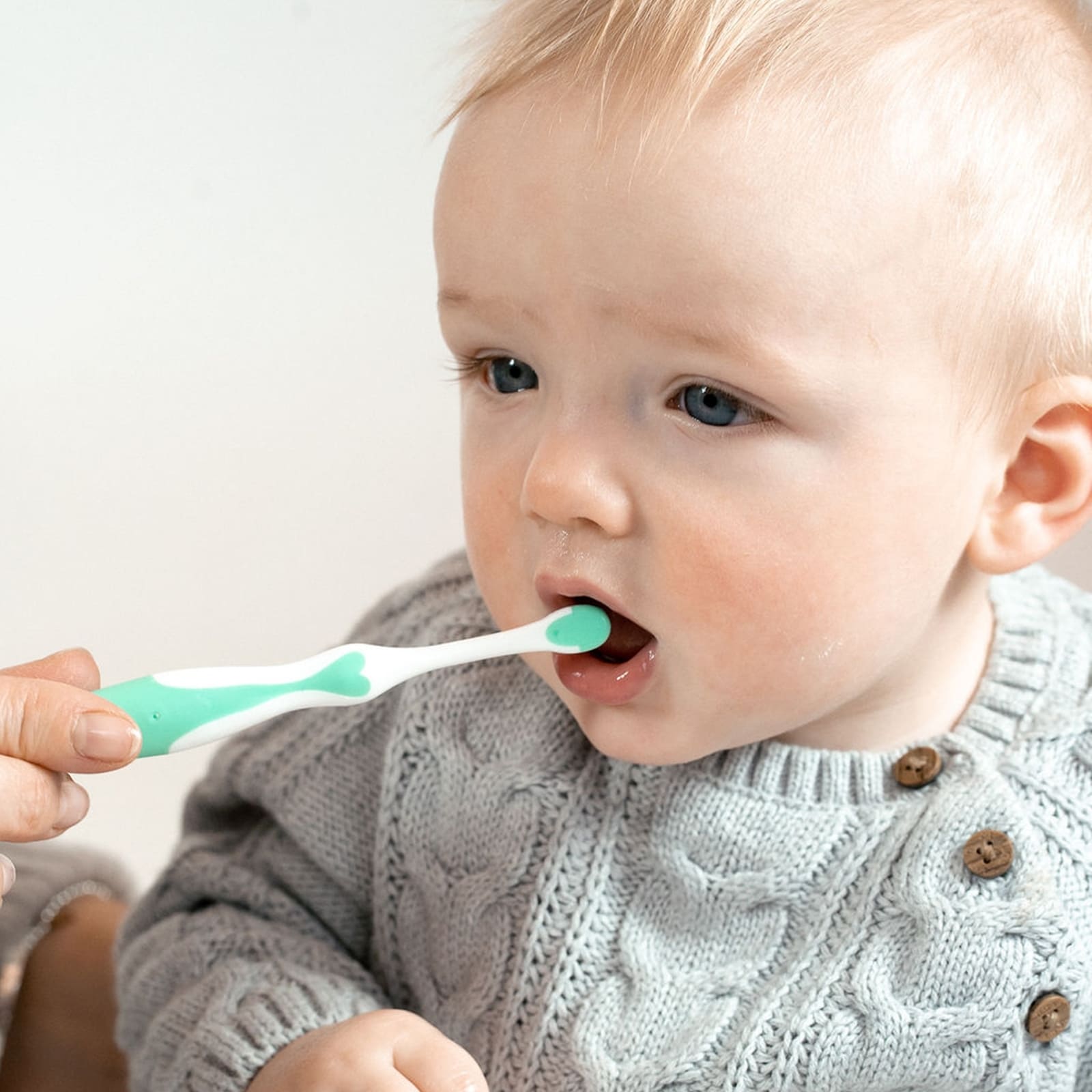 BRUSH-BABY Brosse à dents et anneau de dentition pour bébé