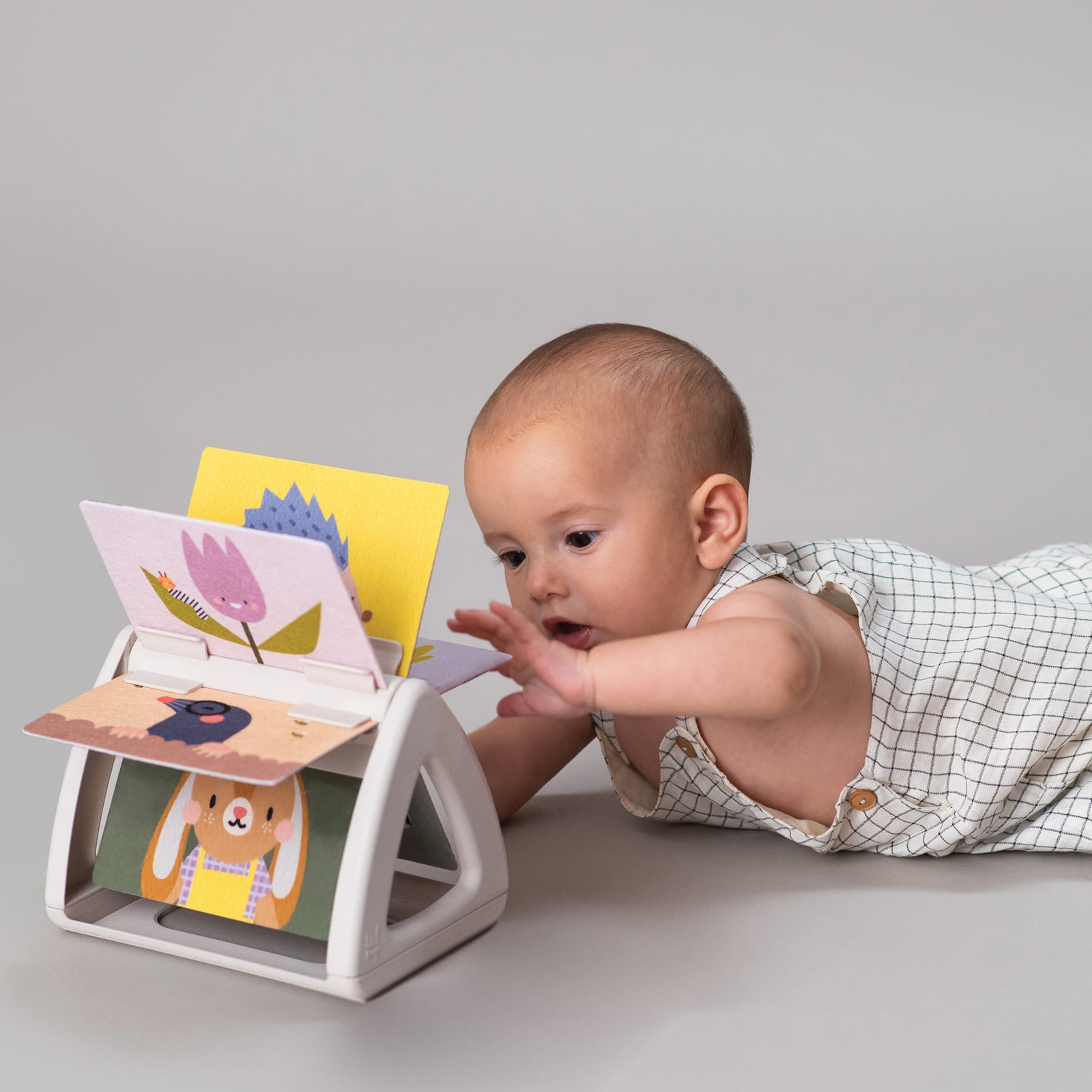 TAF-TOYS Drehbares Babybuch 0M+